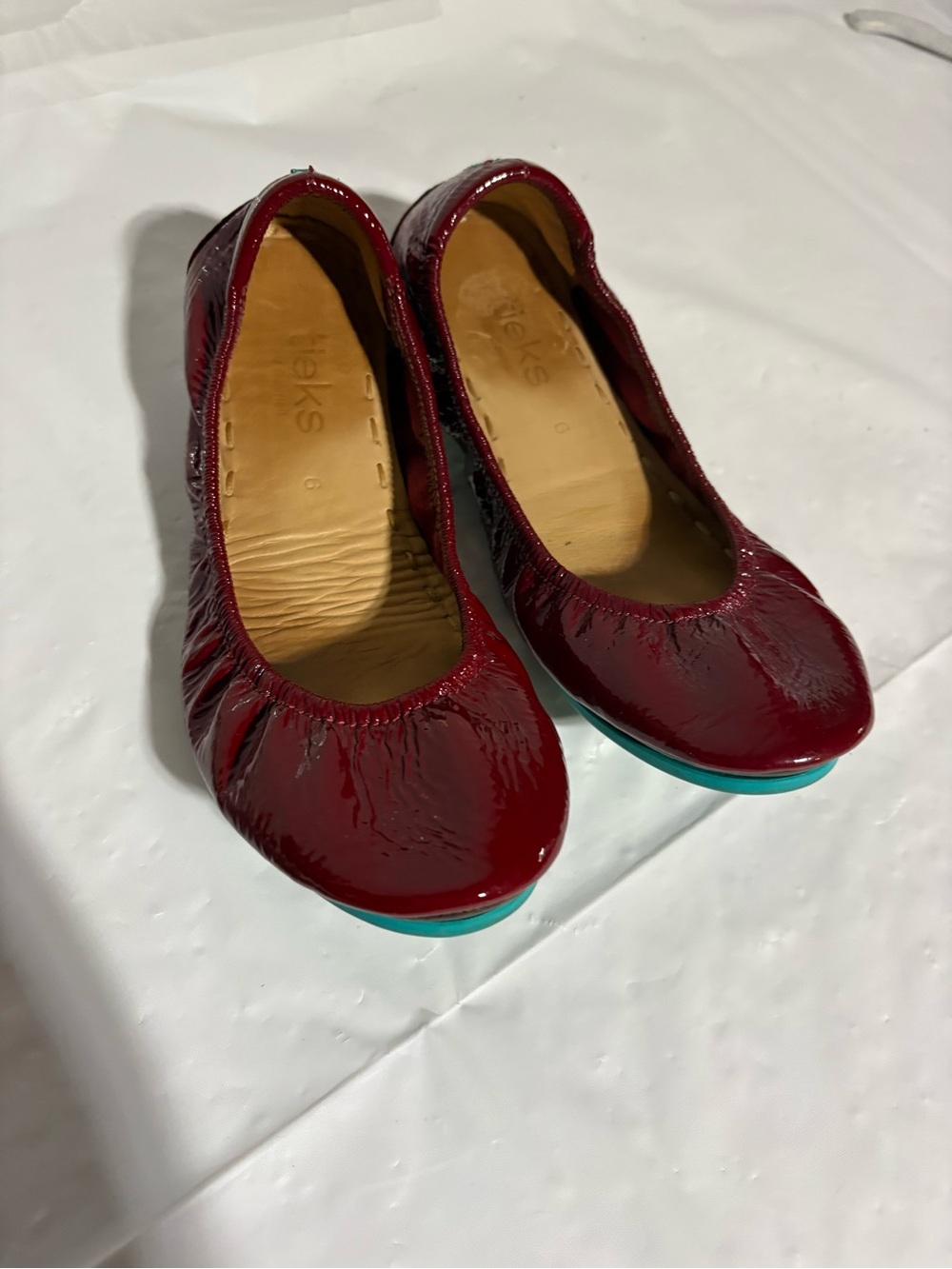 Tieks Women's Burgundy Patent Leather Flats with Teal Soles